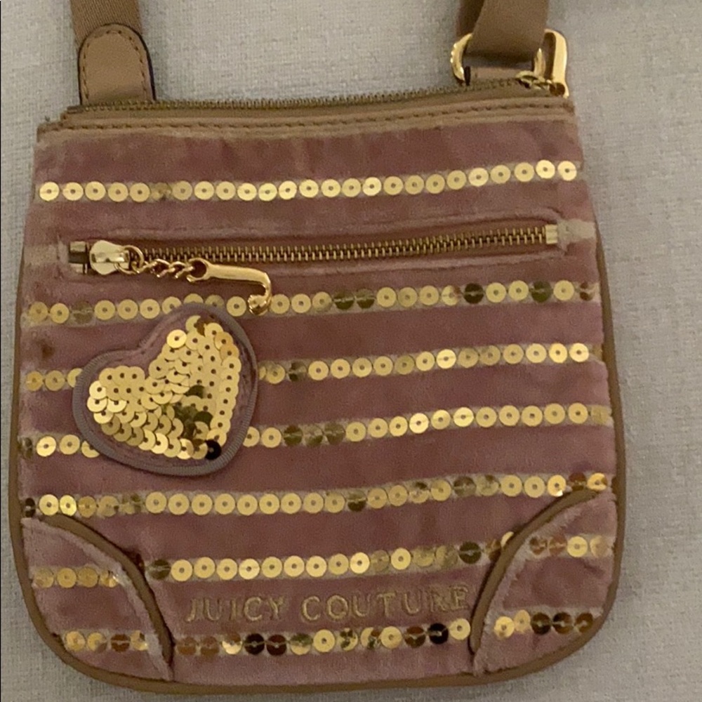 Pink juicy couture purse with gold sequins.
